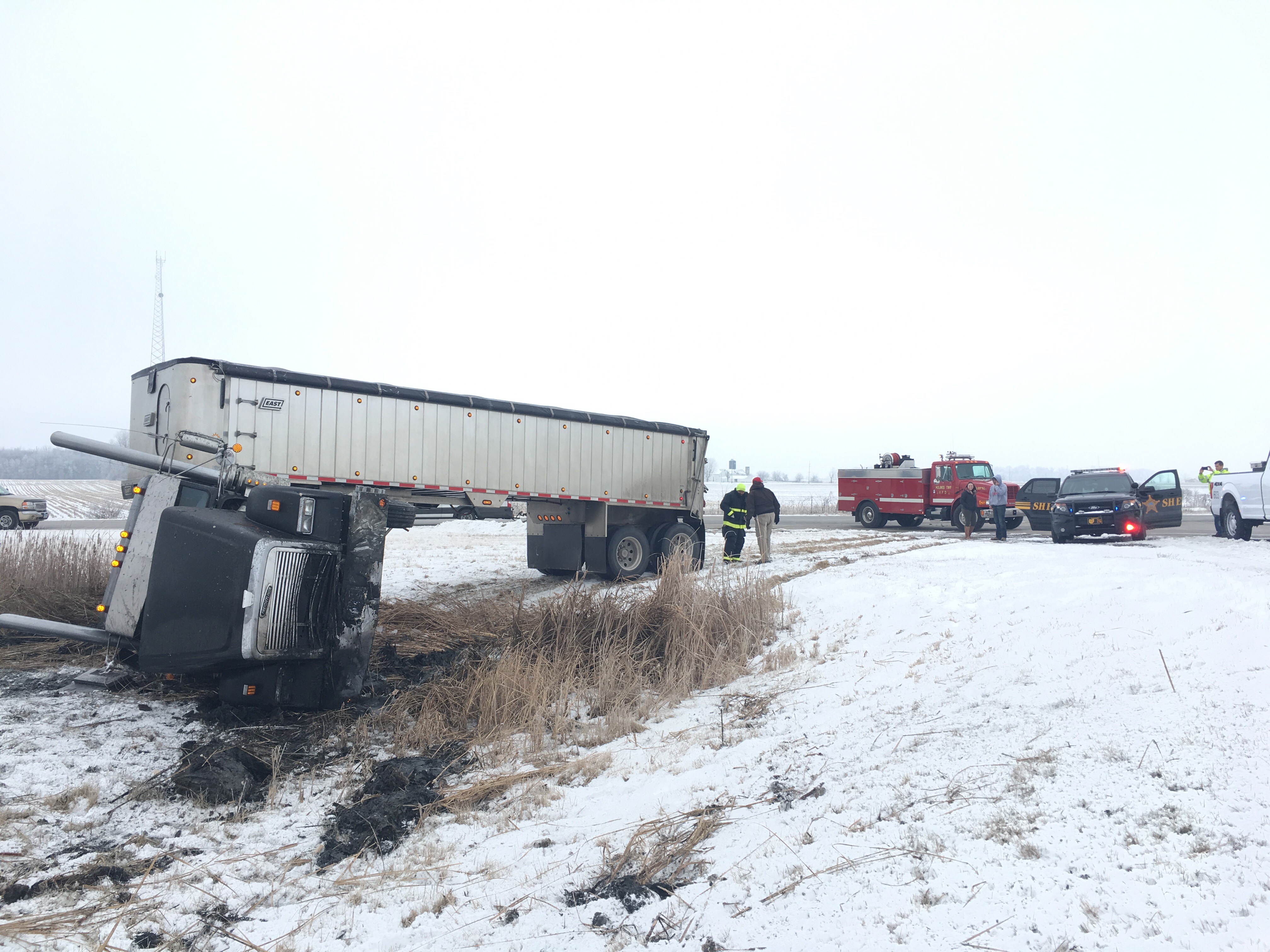 Crews respond to van vs semi crash