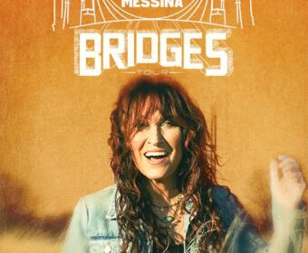 Promotional Bridges Tour poster with an orange background, a smiling woman in a denim jacket, and large BRIDGES text.