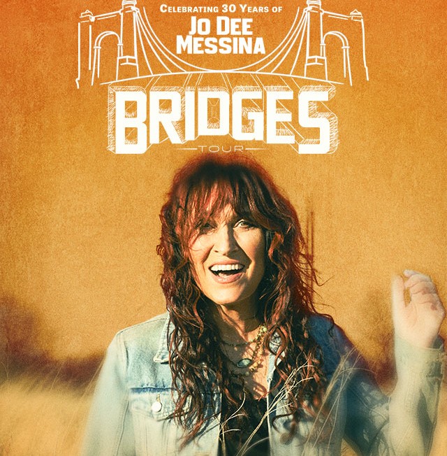 Promotional Bridges Tour poster with an orange background, a smiling woman in a denim jacket, and large BRIDGES text.
