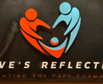 Logo for Love's Reflection: a heart formed by two stylized figures reaching toward a child, with the tagline 'Lighting the path forward' below.