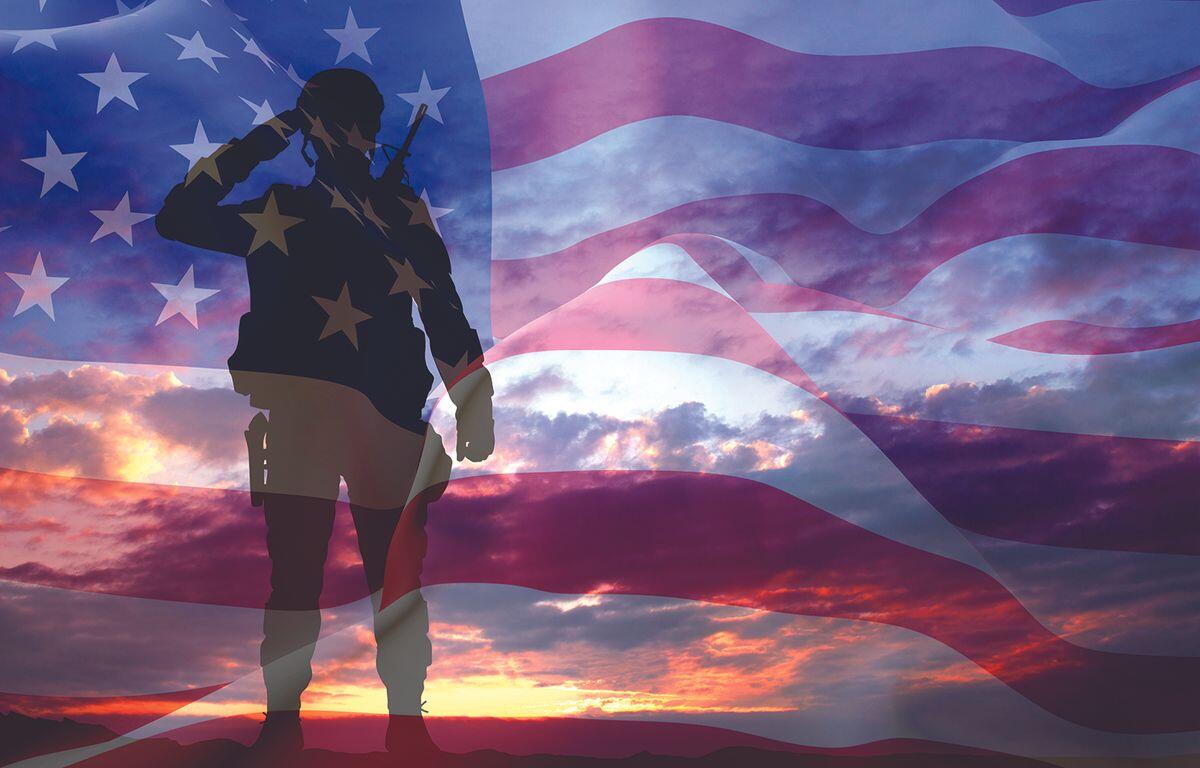 Silhouette of a soldier saluting with a rifle, overlaid on a waving American flag at sunset/dusk Вост.