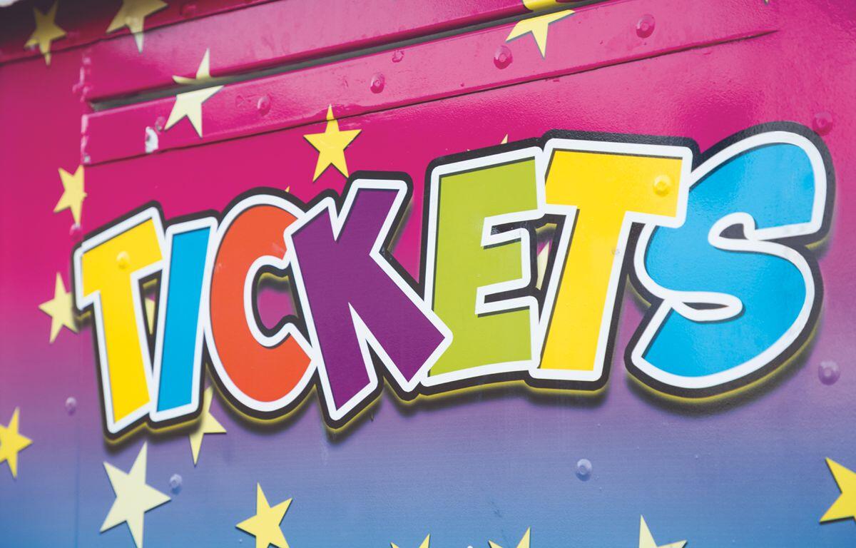 Colorful graffiti-style lettering that spells 'TICKETS' on a pink-to-blue backdrop with yellow stars.